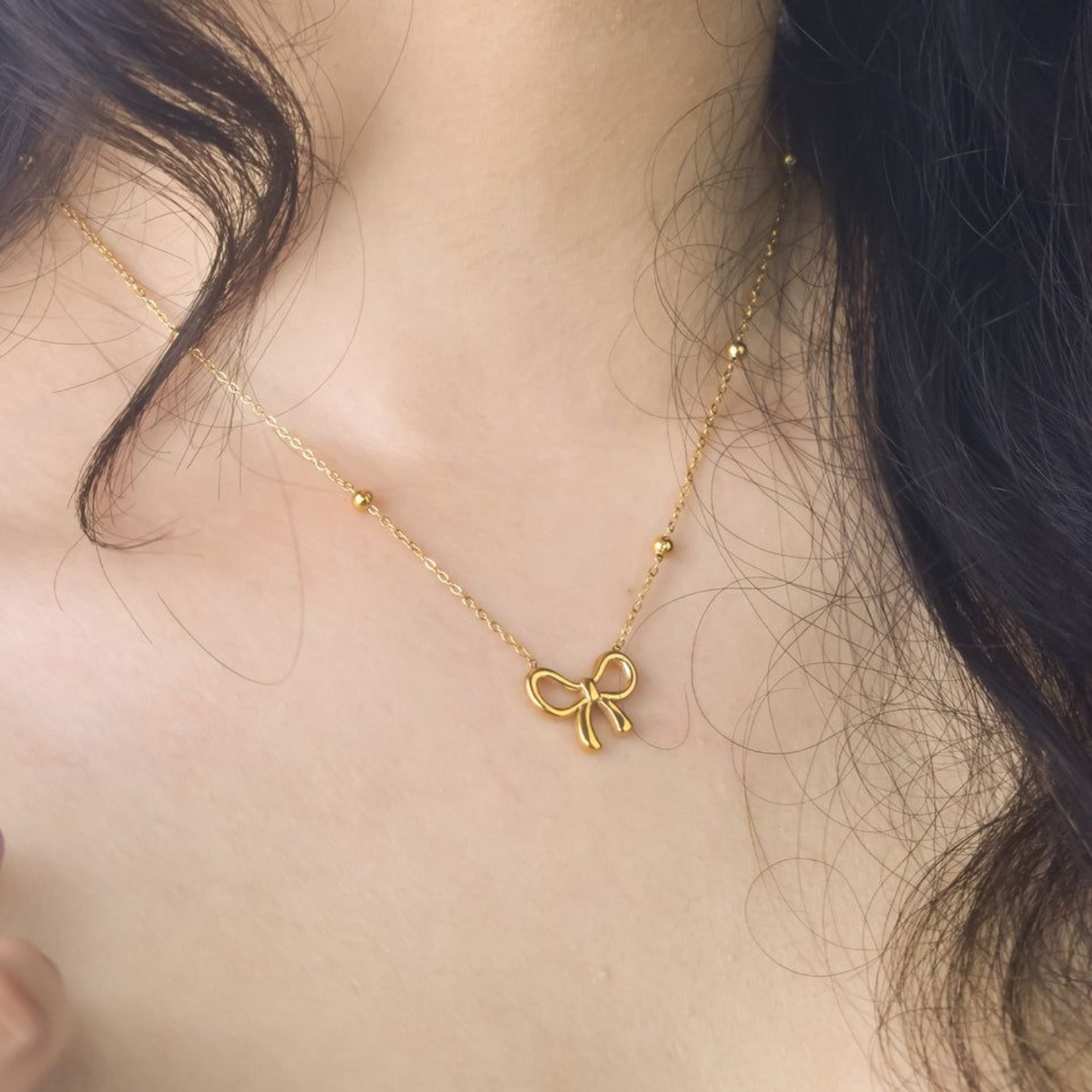 Trendy Hollow 18k Gold Plated Stainless Steel Bow Necklace with Beaded Chain - Image 2